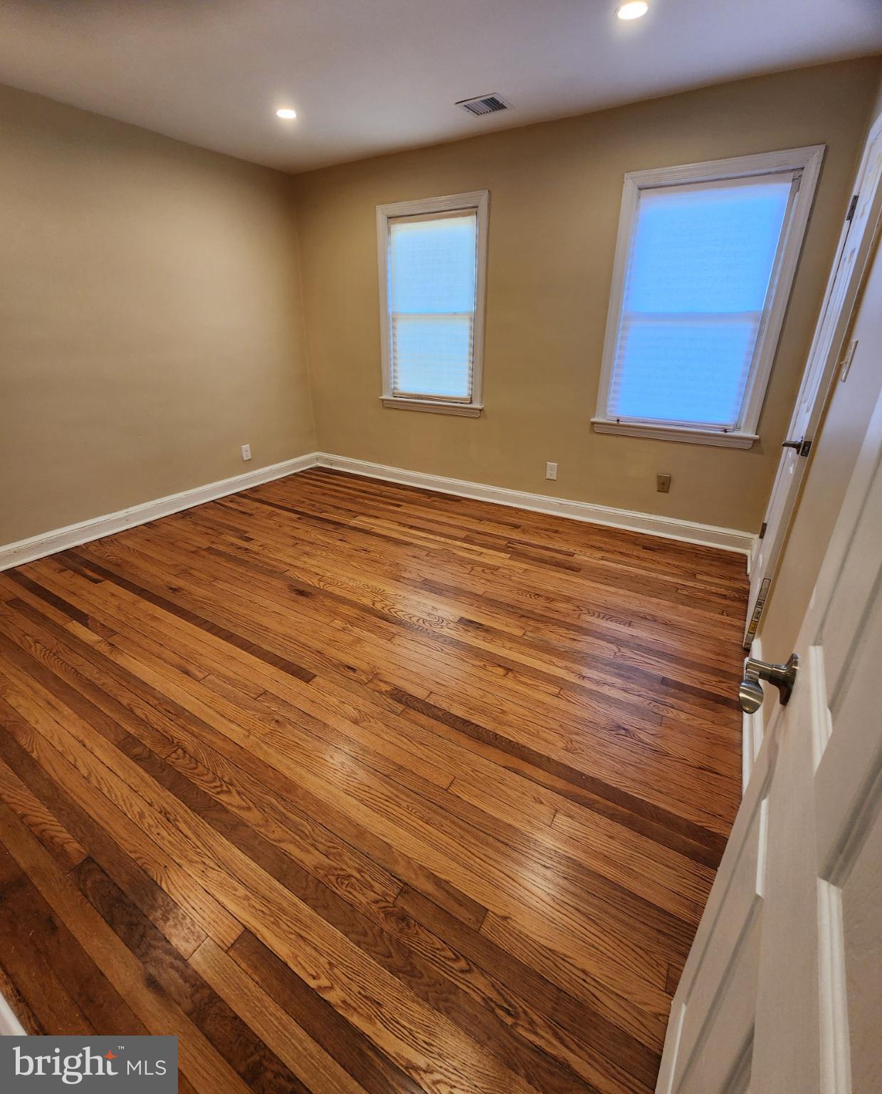 2330 14th Place Southeast Washington, DC 20020 - Photo 9 of 22 a view of empty room with wooden floor