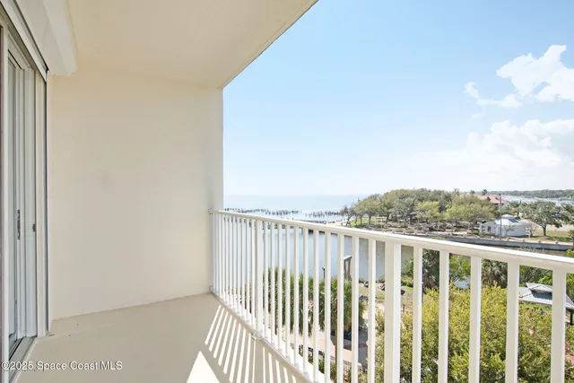 a view of a balcony with an outdoor space