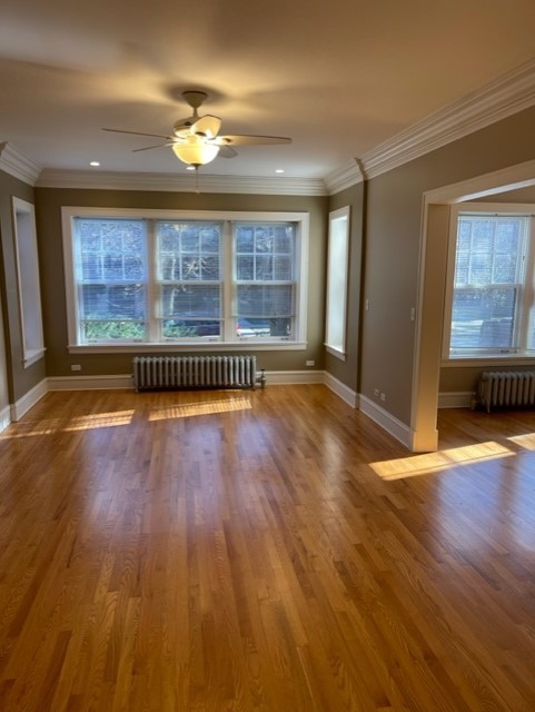 612 Sheridan Road, Unit 1 Evanston, IL 60202 - Photo 8 of 17 a view of empty room with wooden floor and fan