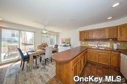 762 Shore Road, Unit LOWR Long Beach, NY 11561 - Photo 5 of 12 a kitchen with counter top space and appliances
