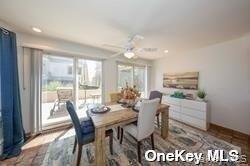 762 Shore Road, Unit LOWR Long Beach, NY 11561 - Photo 6 of 12 a view of a dining room with furniture window and outside view