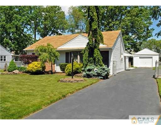 44 Idlewild Road Edison, NJ 08817 - Photo 1 of 15 a view of a house with backyard and garden
