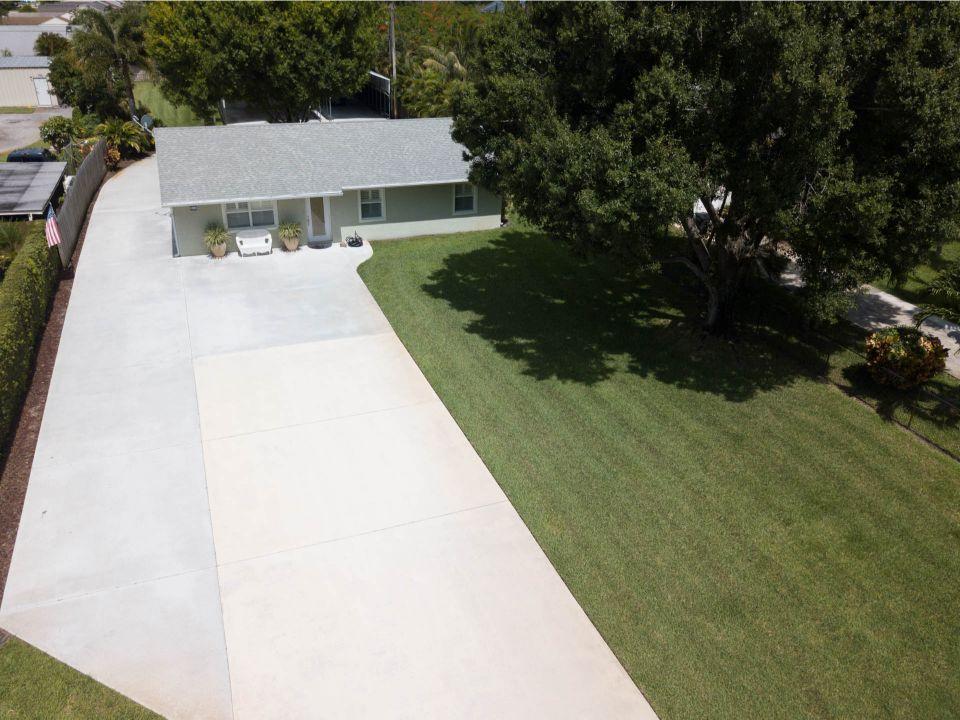 5547 3rd Road Lake Worth, FL 33467 - Photo 24 of 34 a view of a house with a backyard