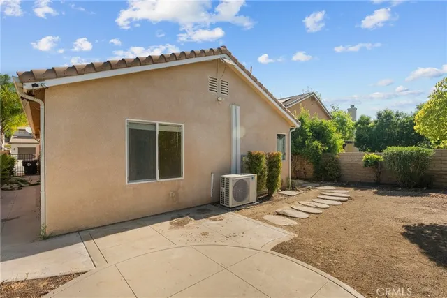 a backyard of a house with seating space