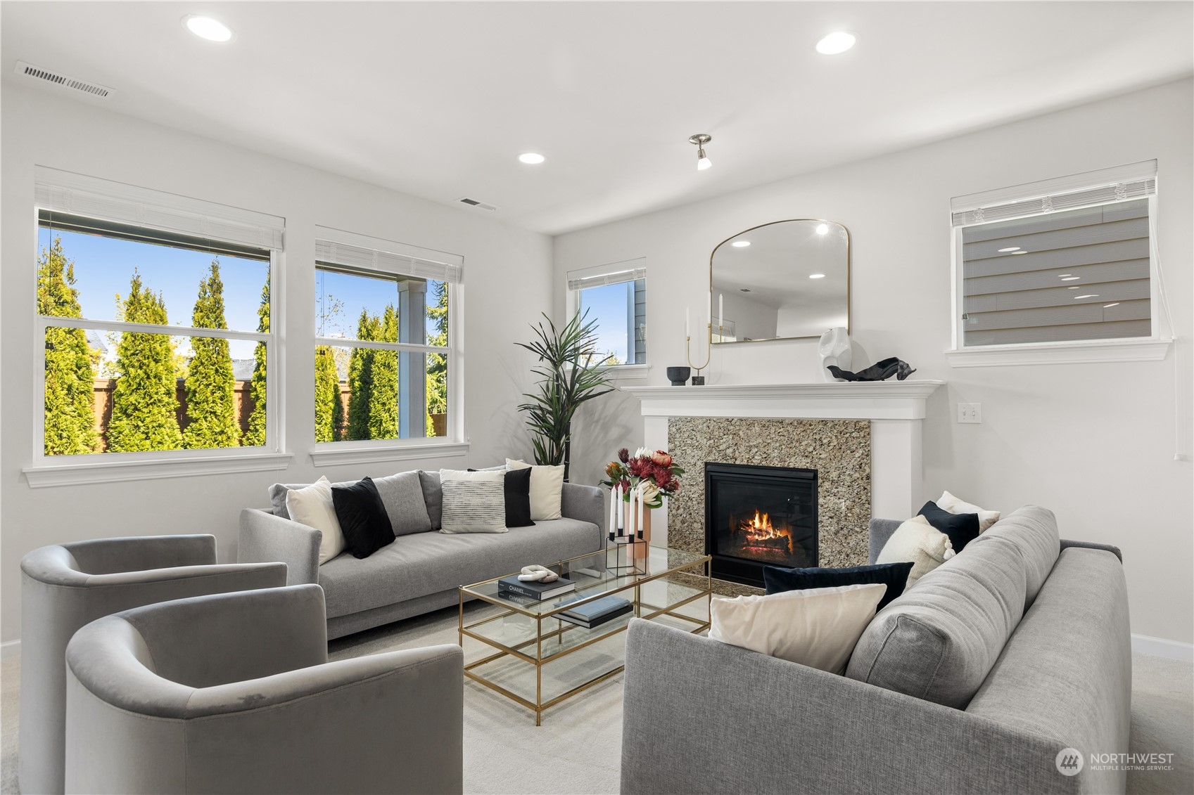 3611 198th Street Southeast Bothell, WA 98012 - Photo 4 of 33 a living room with furniture and a fireplace