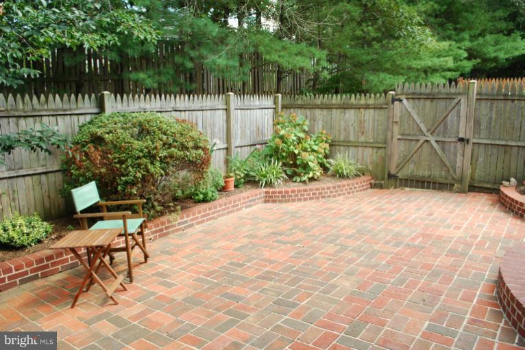 8571 Tyrolean Way Springfield, VA 22153 - Photo 8 of 22 BRICK PATIO BACKS TO COMMON AREA