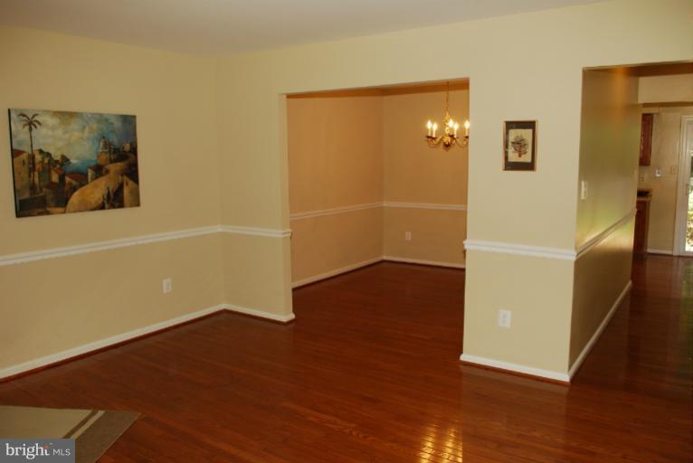 8571 Tyrolean Way Springfield, VA 22153 - Photo 9 of 22 LOOKING INTO DINING RM FROM LR