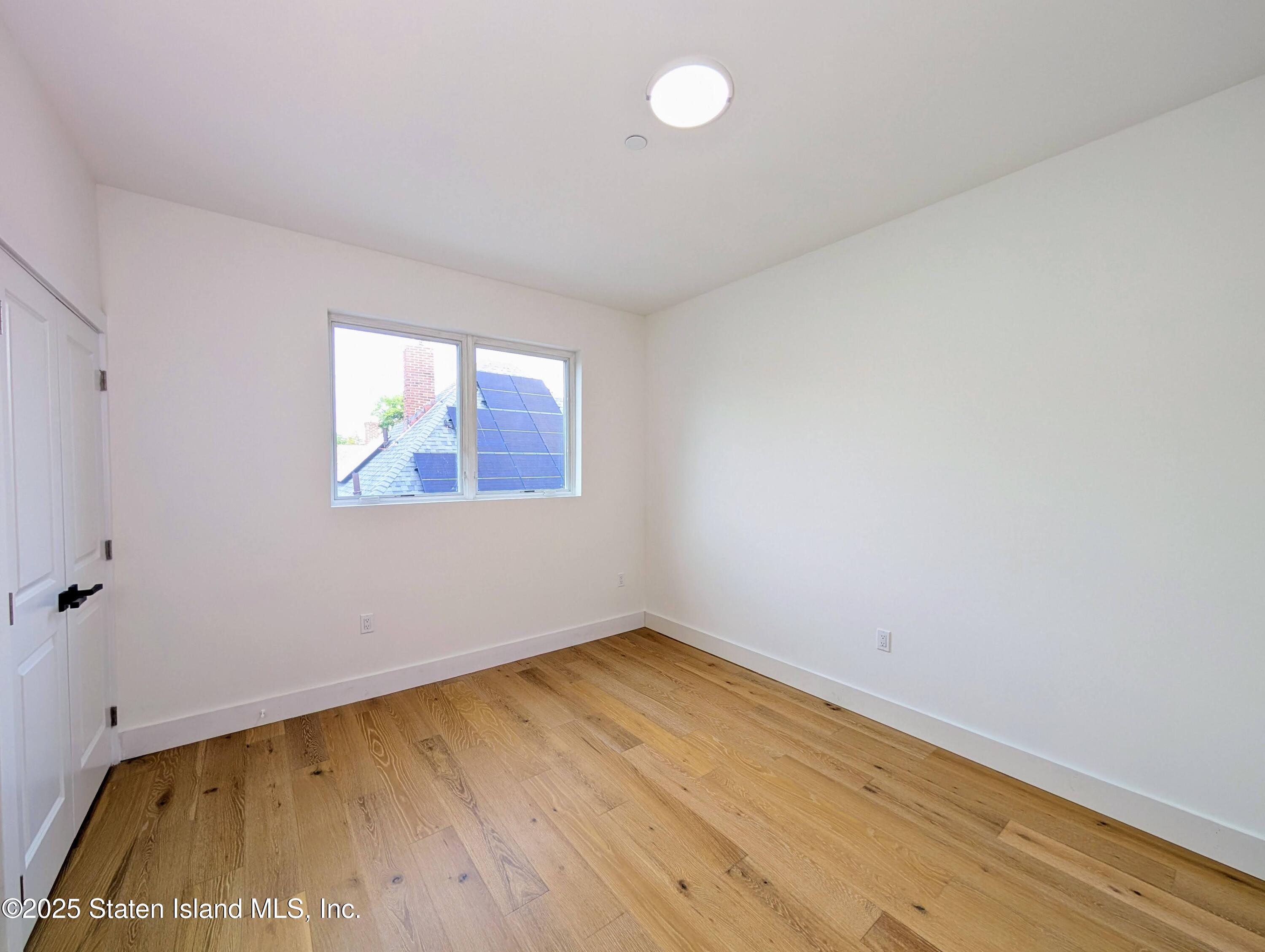 3865 Amboy Road, Unit 4B Staten Island, NY 10308 - Photo 16 of 20 an empty room with a window