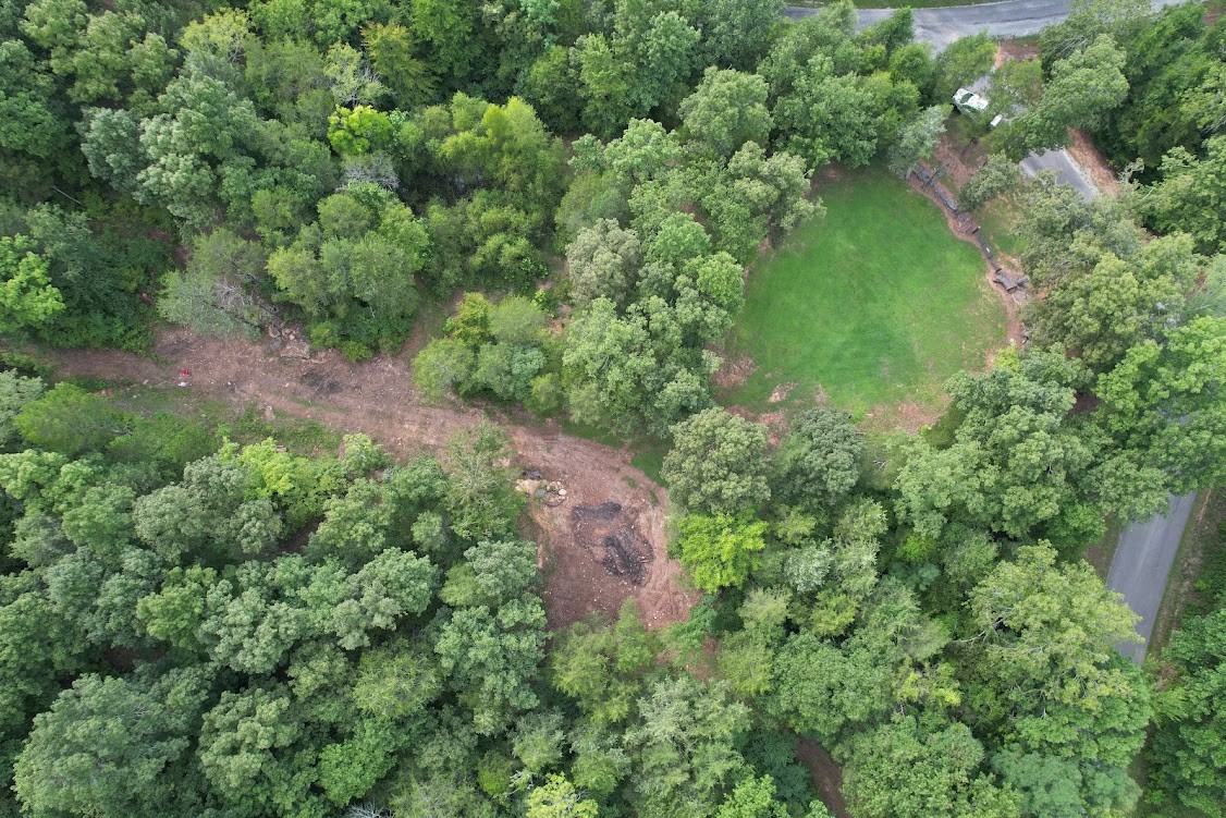 0 New Era Landing Road Linden, TN 37096 - Photo 16 of 18 an aerial view of residential house with outdoor space and trees all around