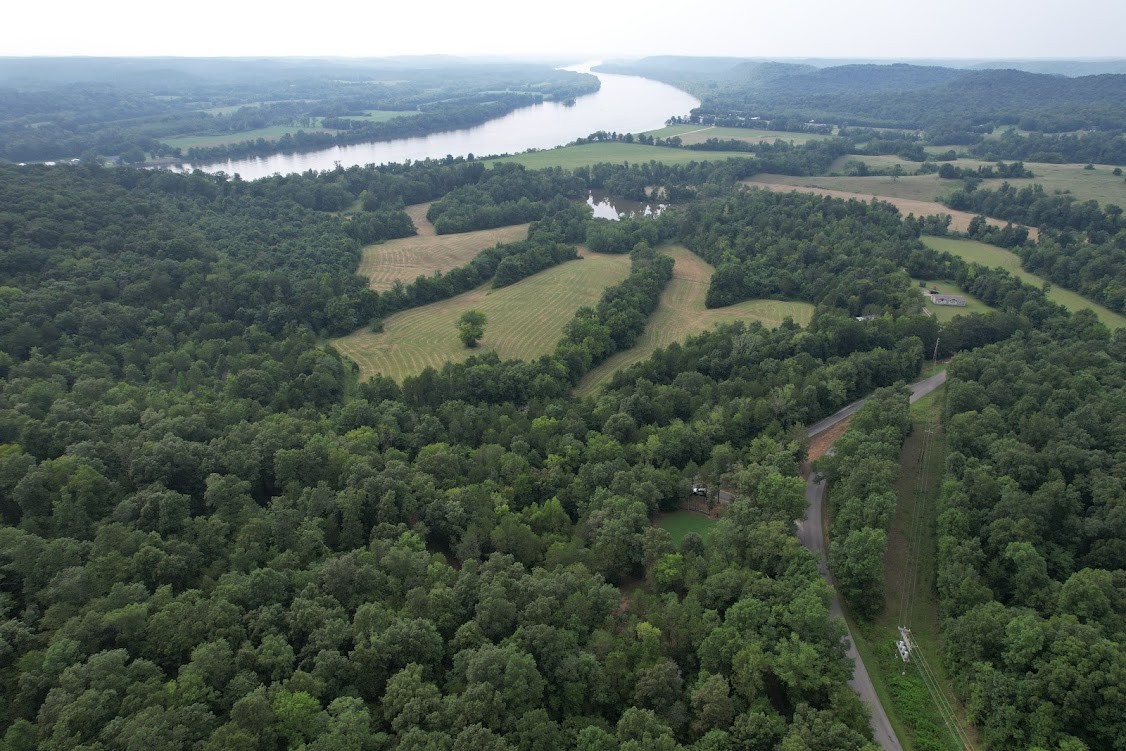 0 New Era Landing Road Linden, TN 37096 - Photo 17 of 18 an aerial view of house with yard and mountain view in back