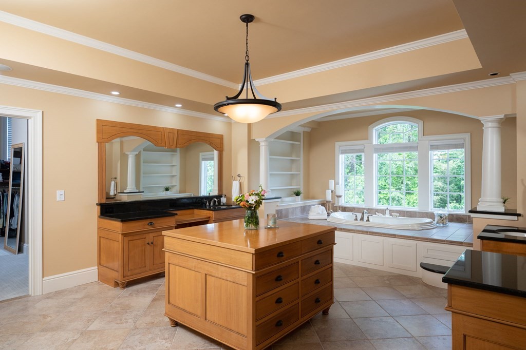 6 High Meadow Road Andover, MA 01810 - Photo 19 of 32 a kitchen with a stove a sink and a refrigerator