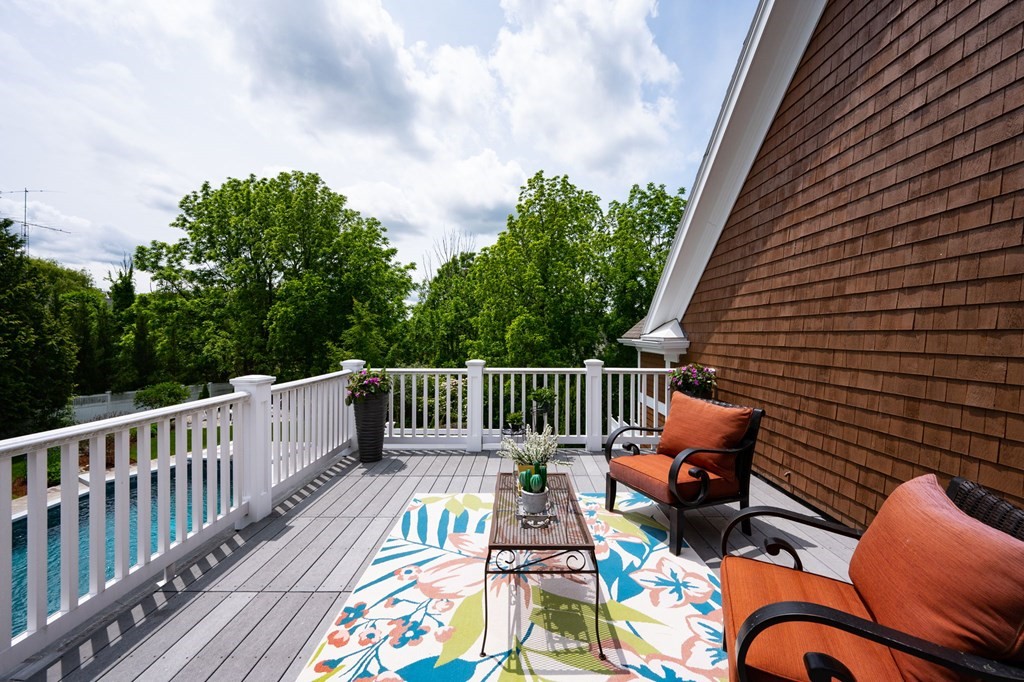 6 High Meadow Road Andover, MA 01810 - Photo 21 of 32 a view of balcony with wooden floor and outdoor seating