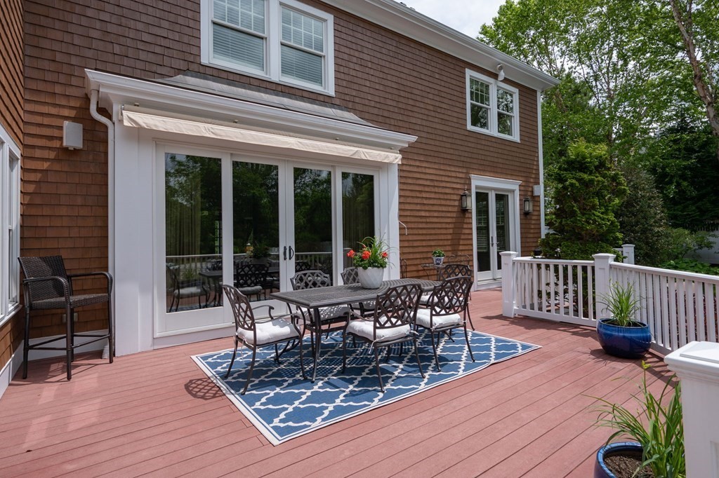 6 High Meadow Road Andover, MA 01810 - Photo 25 of 32 a view of a house with sitting area and wooden floor