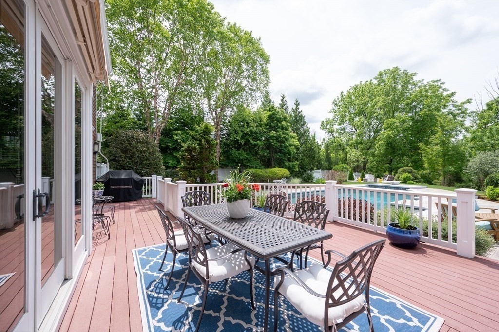 6 High Meadow Road Andover, MA 01810 - Photo 26 of 32 a view of balcony with furniture and wooden floor