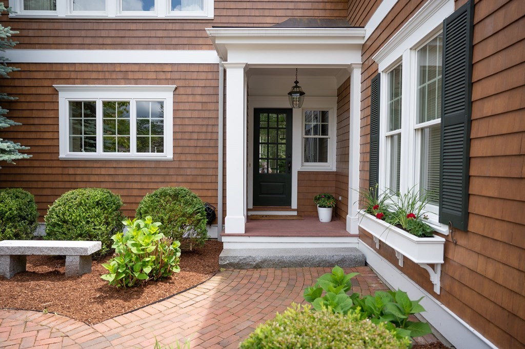 6 High Meadow Road Andover, MA 01810 - Photo 31 of 32 a front view of a house with a yard