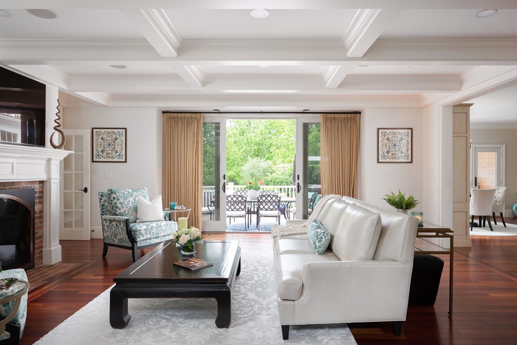 6 High Meadow Road Andover, MA 01810 - Photo 6 of 32 a living room with furniture and a fireplace