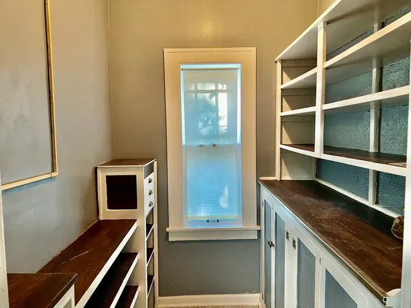 a kitchen that has a sink and a stove