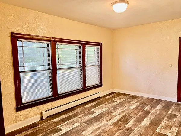 a view of a room with windows