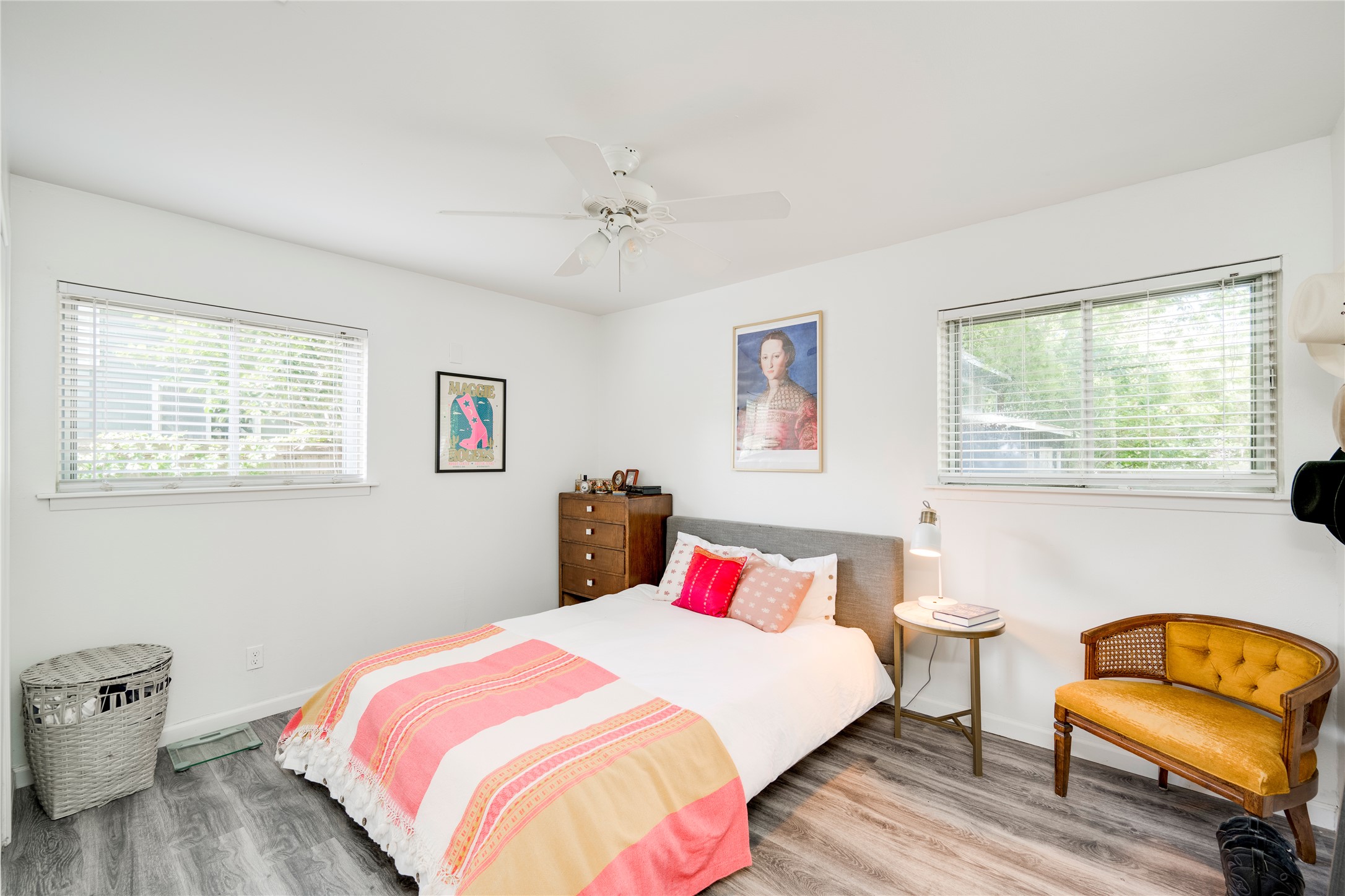 5300 Halmark Drive Austin, TX 78723 - Photo 19 of 40 A comfortable bedroom offering ample light, ideal for peaceful slumber.
