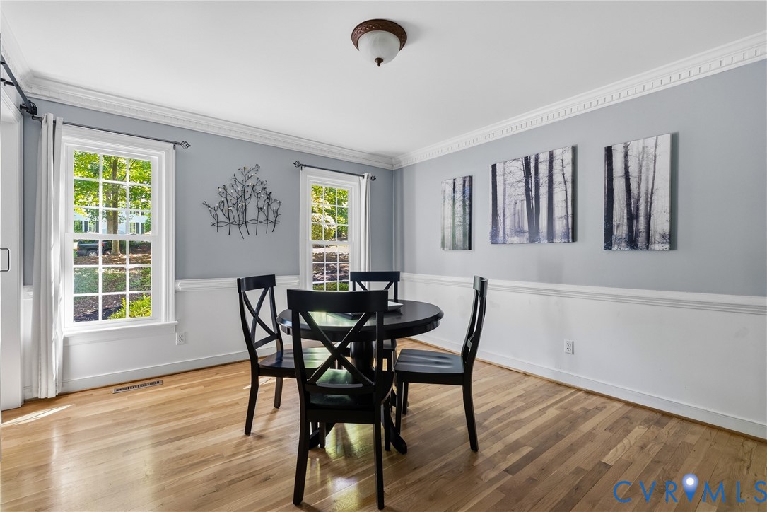 14321 Crossings Ridge Drive Midlothian, VA 23113 - Photo 8 of 43 a view of a dining room with furniture and a window