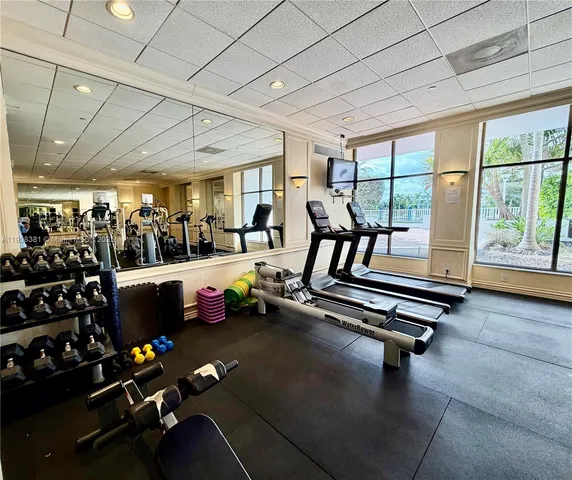 a view of swimming pool with an outdoor seating
