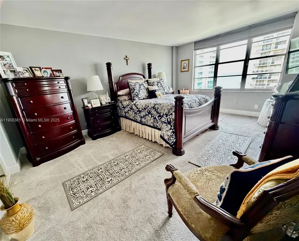 a kitchen with a sink and a stove top oven