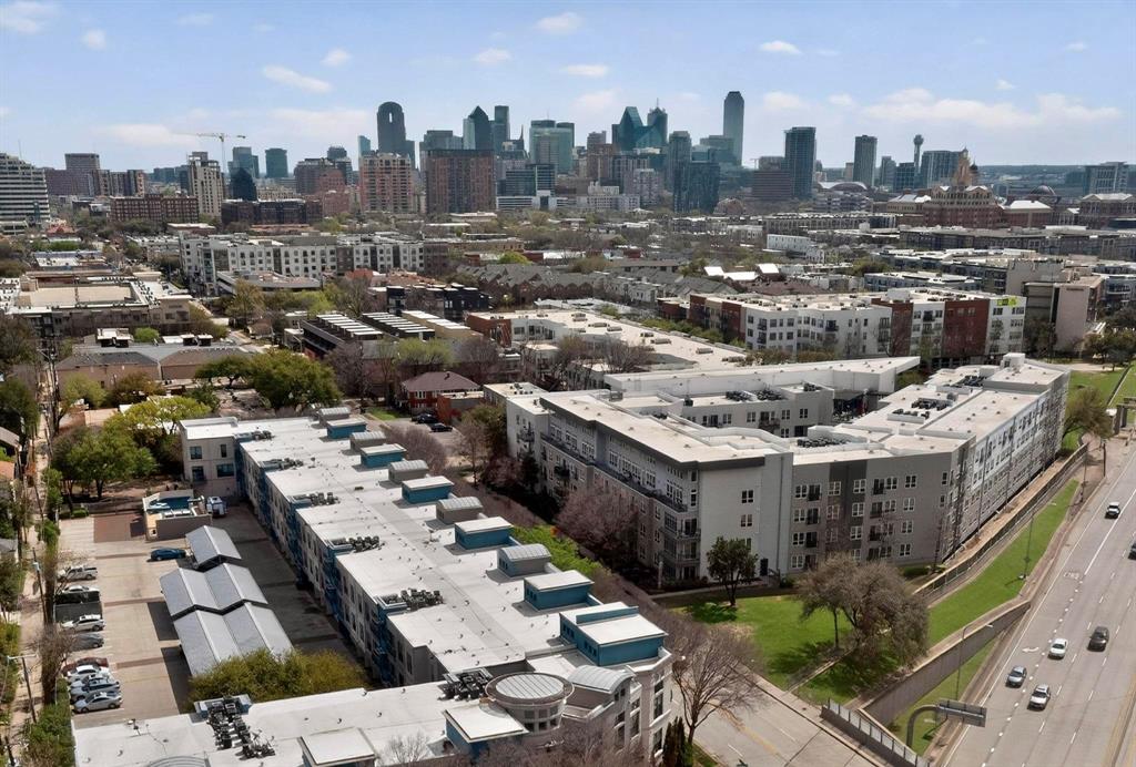 4414 Cedar Springs Road, Unit 318 Dallas, TX 75219 - Photo 11 of 40 Expansive urban landscape featuring multiple modern residential buildings