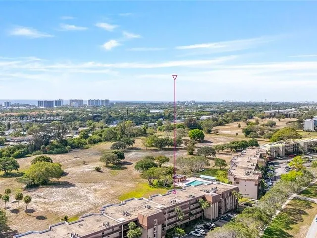 an aerial view of a city with lots of residential buildings