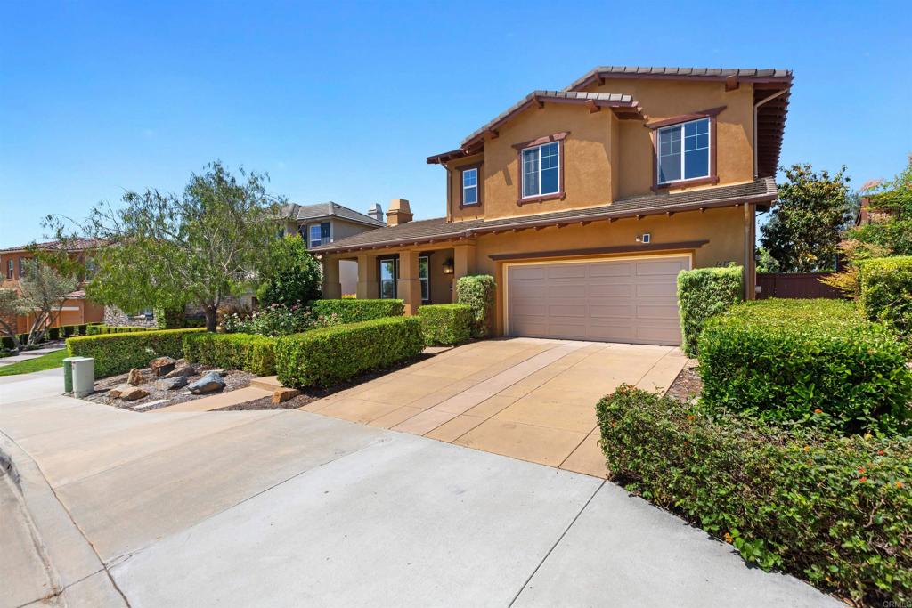 1415 Eclipse Drive San Marcos, CA 92078 - Photo 11 of 57 front view of a house with a yard