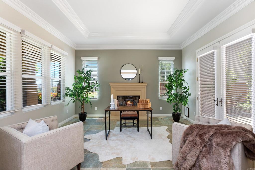 1415 Eclipse Drive San Marcos, CA 92078 - Photo 16 of 57 a living room with furniture a potted plant and a window