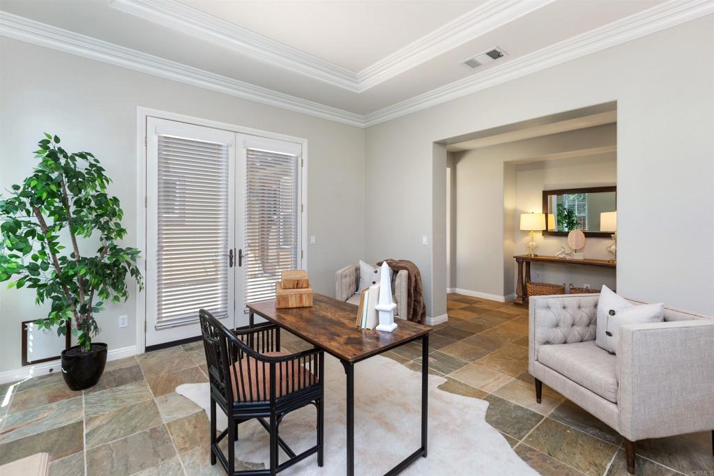 1415 Eclipse Drive San Marcos, CA 92078 - Photo 17 of 57 a living room with furniture and a potted plant