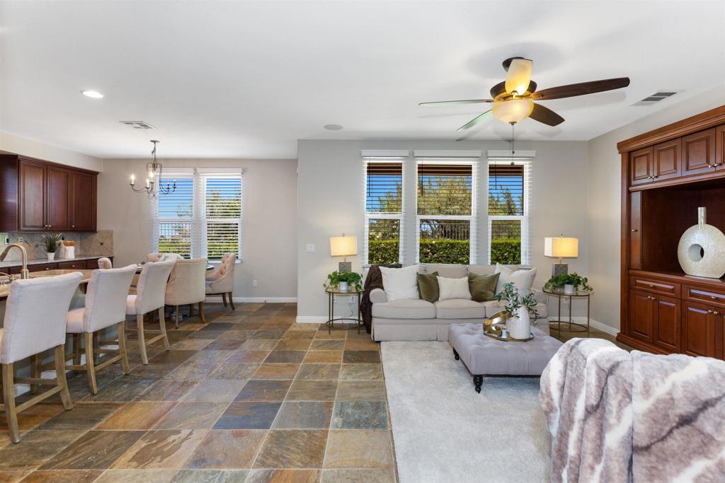 1415 Eclipse Drive San Marcos, CA 92078 - Photo 22 of 57 a living room with furniture and a large window