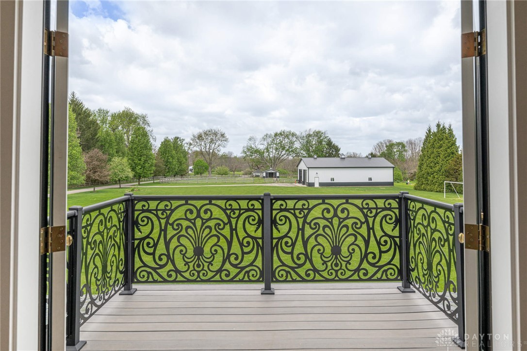 9586 Ferry Road Waynesville, OH 45068 - Photo 13 of 40 This outdoor space offers expansive views of green fields and distant structures.