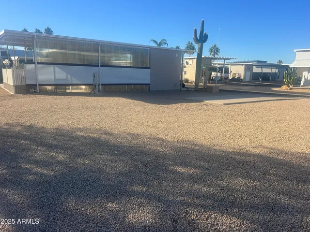 a view of a yard with a lake view