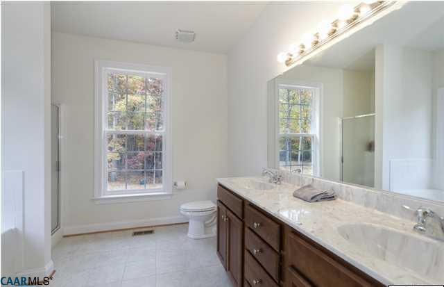 1978 Miller School Road Charlottesville, VA 22903 - Photo 8 of 18 a bathroom with a granite countertop sink mirror and a window
