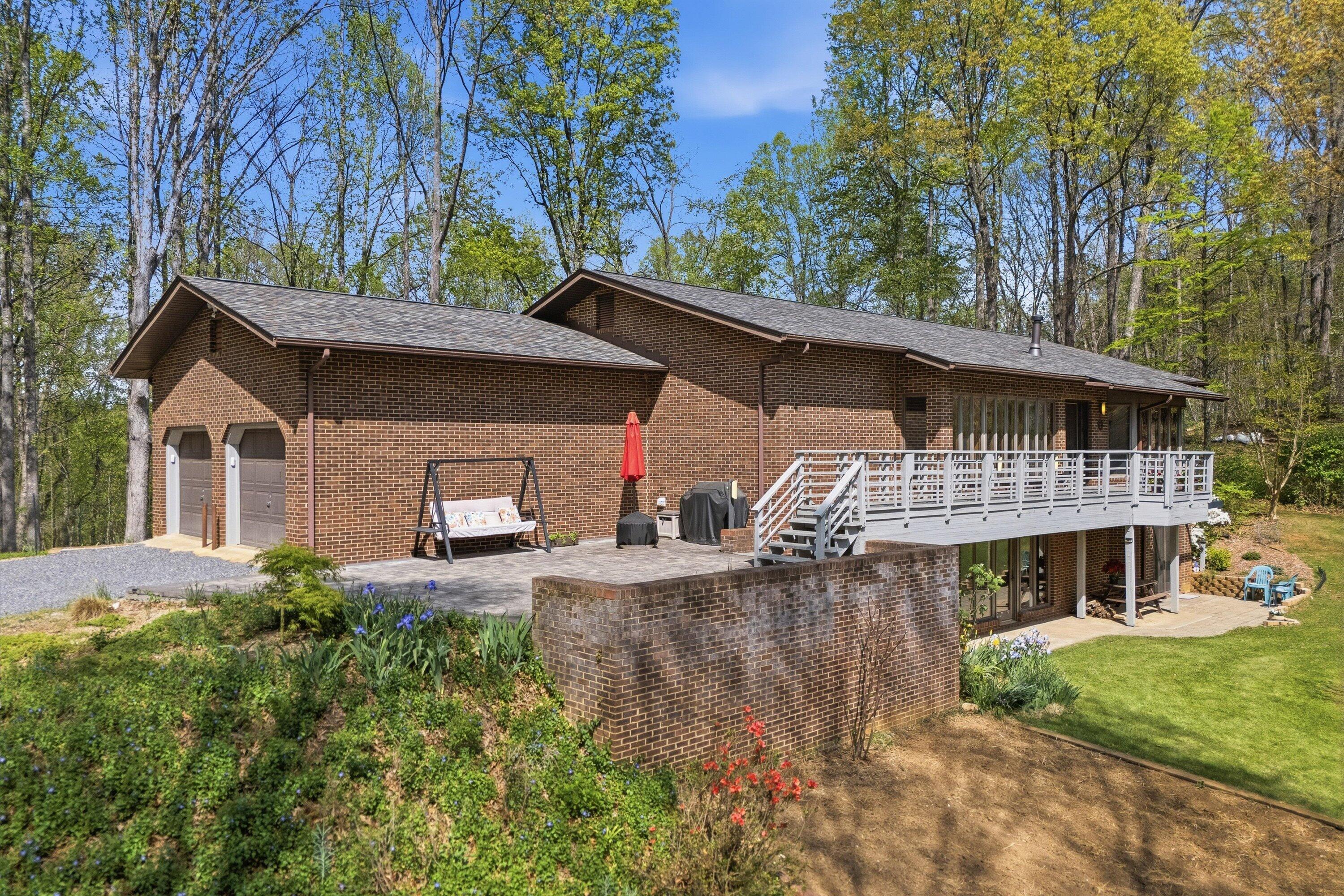 1124 Old Hollow Road Buchanan, VA 24066 - Photo 2 of 73 a front view of house with yard and trees in the background