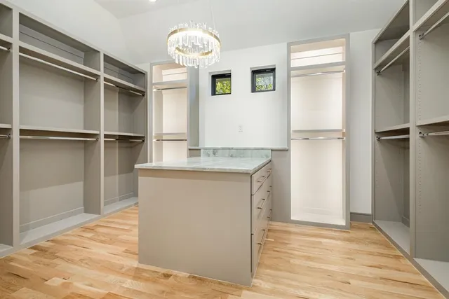 a view of cabinets and wooden floor