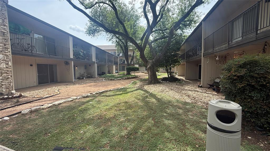 500 East Riverside Drive, Unit 132 Austin, TX 78704 - Photo 19 of 31 a backyard of a house with yard and tree