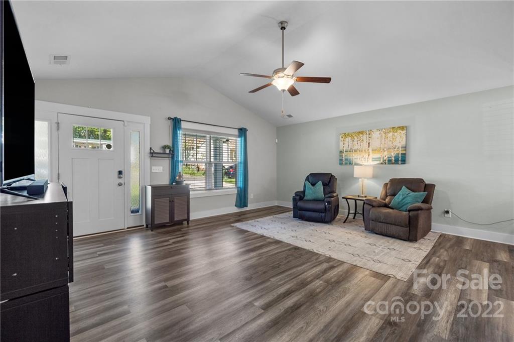 30 Rose Street York, SC 29745 - Photo 5 of 31 a living room with furniture and a wooden floor