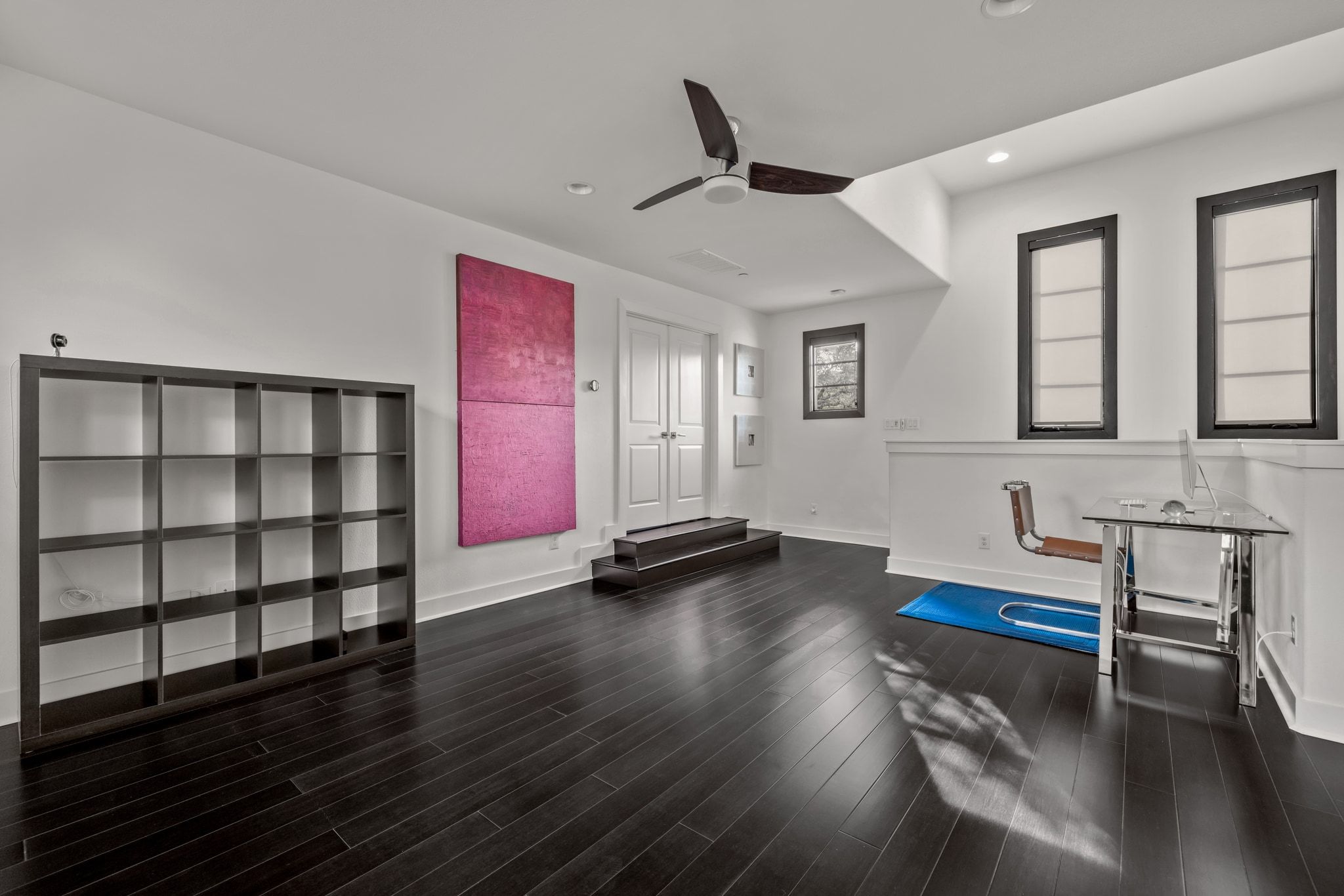 4720 Rockcliff Road, Unit 1 Austin, TX 78746 - Photo 31 of 39 Rich hardwood floors create a chic, inviting atmosphere in this versatile bonus room.