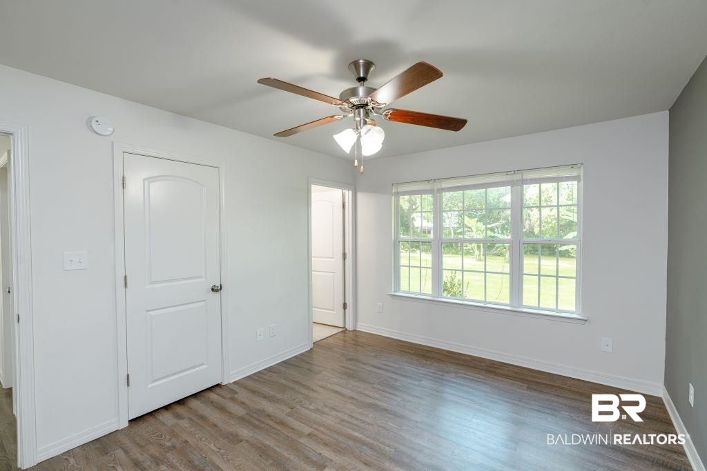 12641 Pecan Street Grand Bay, AL 36541 - Photo 14 of 23 Interior space with hardwood / wood-style flooring and ceiling fan