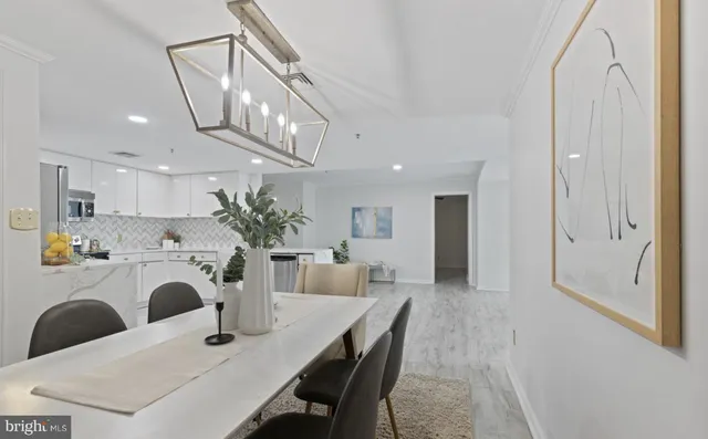 a kitchen with a stove a sink and a microwave