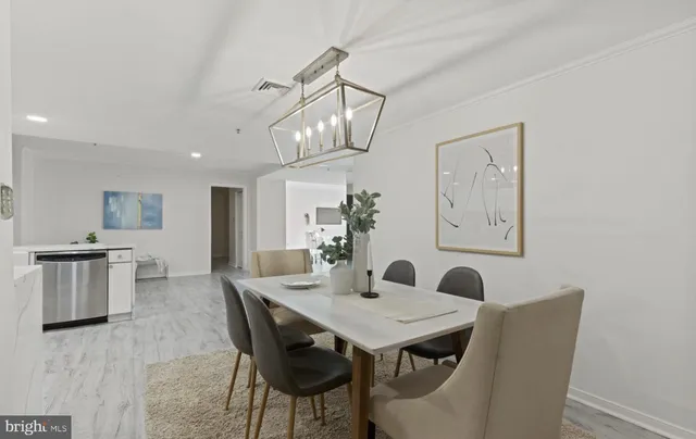 a kitchen with stainless steel appliances granite countertop a sink and stove top oven