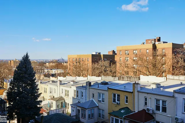a bathroom with a toilet sink and shower