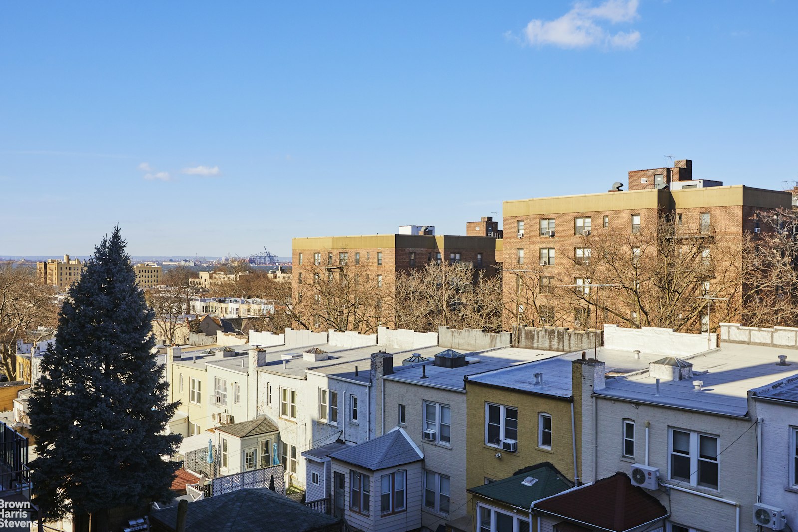 131 74th Street, Unit 3B Brooklyn, NY 11209 - Photo 6 of 10 a view of a city with tall buildings