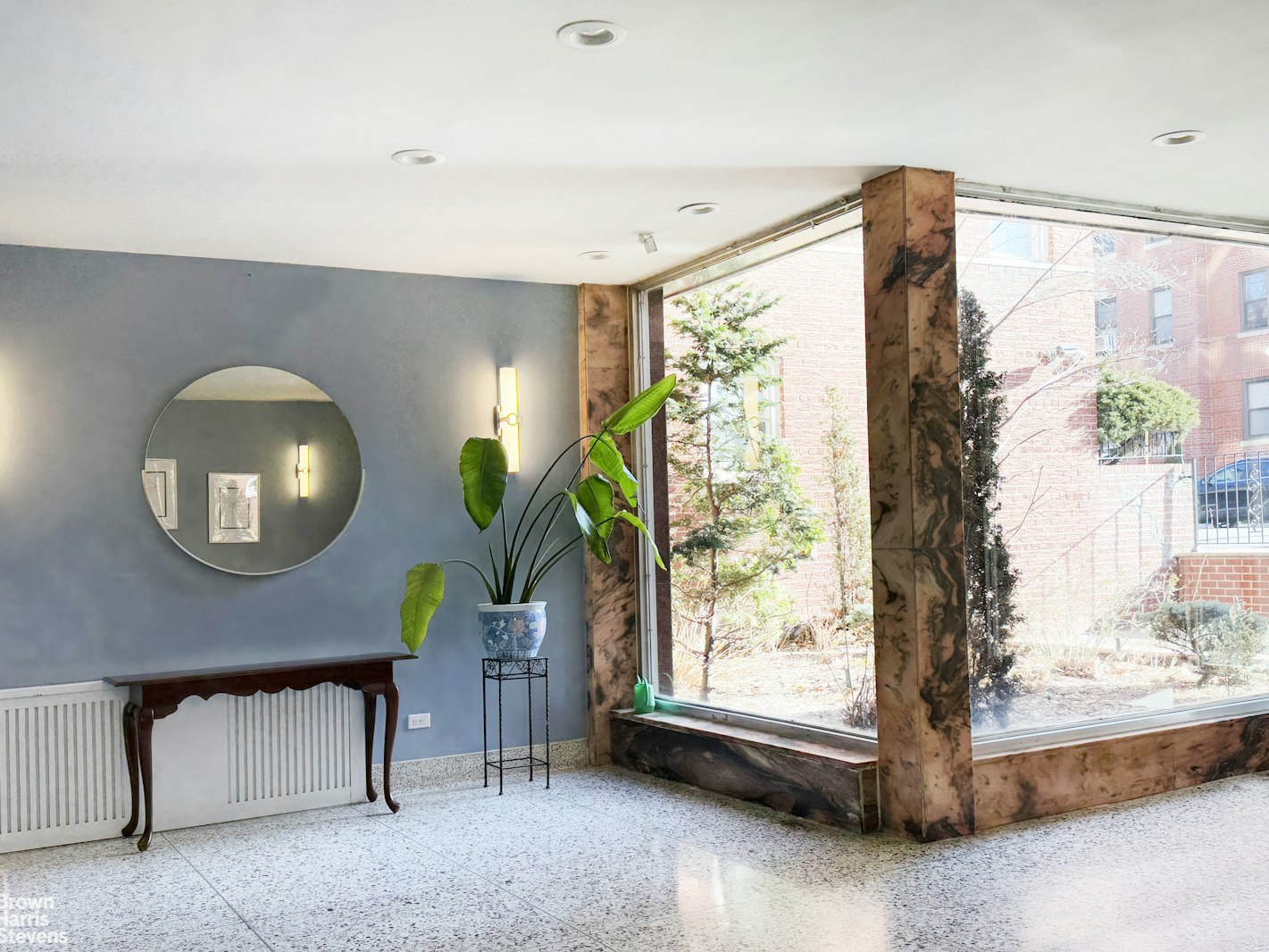 131 74th Street, Unit 3B Brooklyn, NY 11209 - Photo 7 of 10 a living room with furniture and a large window