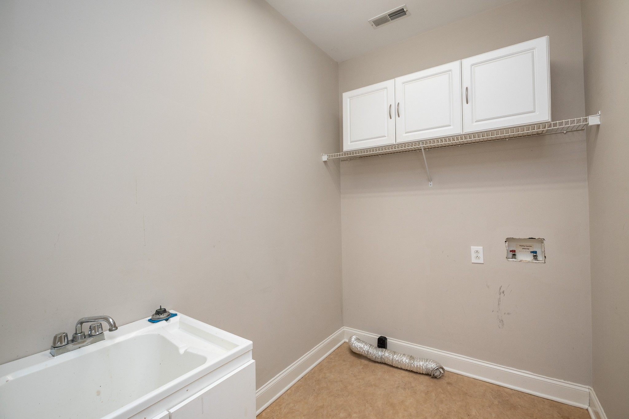 2399 Jack Teasley Road Pleasant View, TN 37146 - Photo 40 of 48 a bathroom with a sink and cabinets