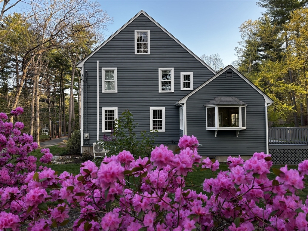 142 Baker Street Walpole, MA 02081 - Photo 3 of 42 a front view of a house