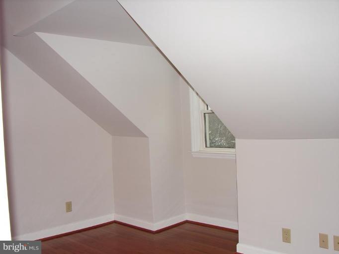 2917 Paper Mill Road Phoenix, MD 21131 - Photo 5 of 21 a view of staircase with wooden floor