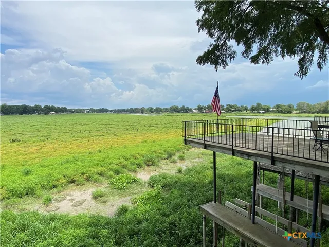 a view of a garden with a lake